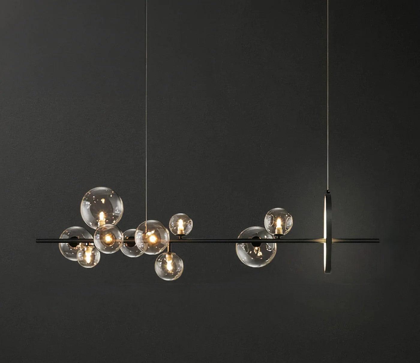 Alyuvar Tavan Aydınlatması, modern tasarımlı metal gövde ve cam küre detaylarıyla şık bir avize. G-9 duy uyumlu, el yapımı ve uzun ömürlü.